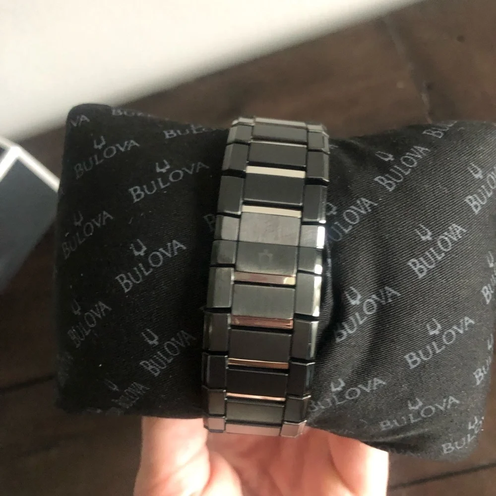 Bulova black watch.